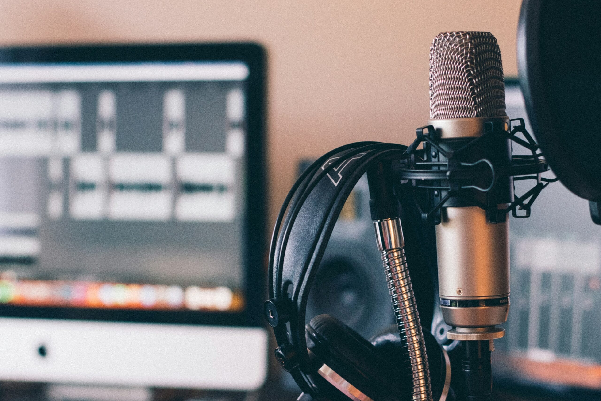 Podcast setup in a room with computer and mic setup